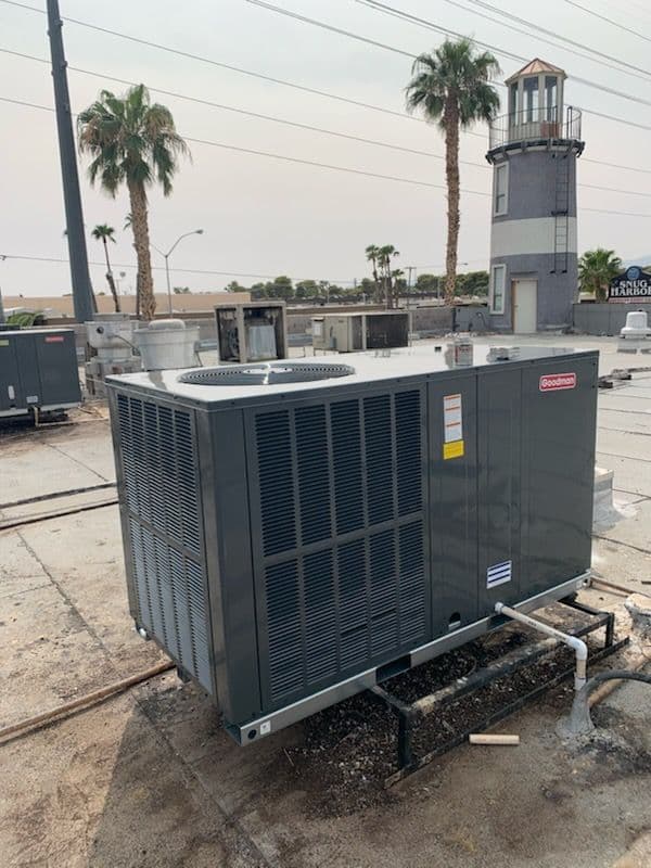 Gallery photos for Rooftop HVAC Specialists in Action - Efficiency Guaranteed: Image #2